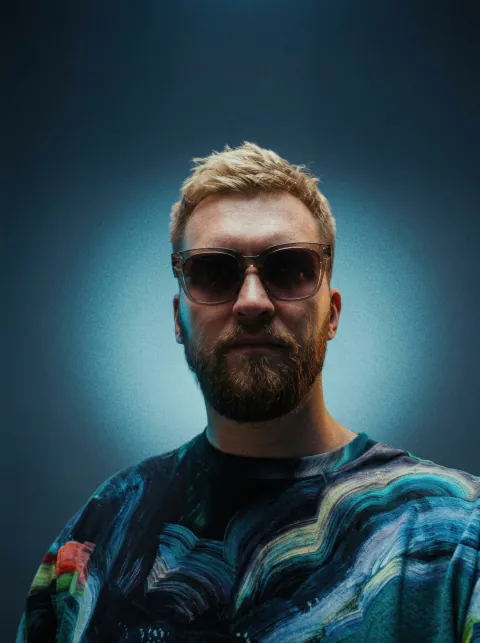 Tvardovsky in sunglasses with blue backlight, 2026
