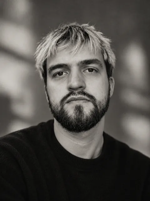 Tvardovsky, black-and-white outdoor close-up portrait, 2026